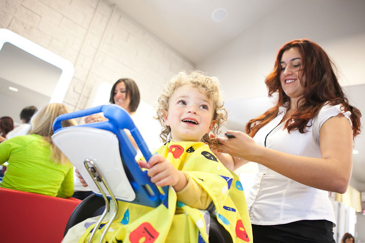 Boy getting hair cut
